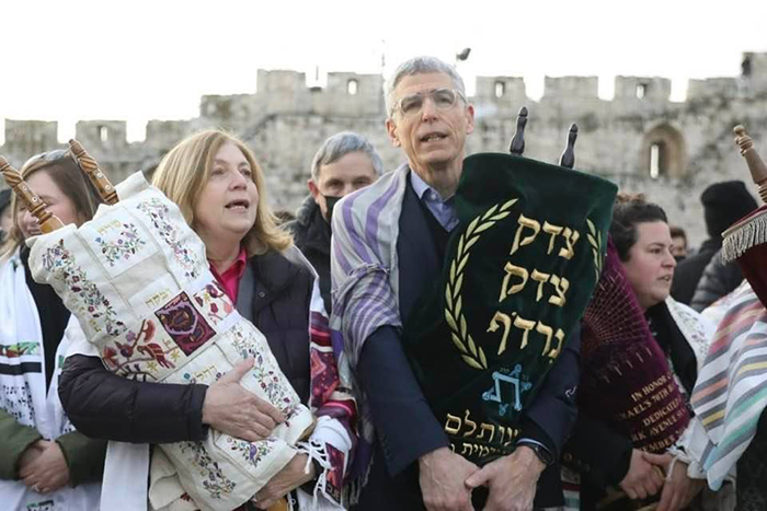 Rabbi Rick Jacobs and Anat Hoffman holding Torahs at the Kotel on Rosh Chodesh Adar Bet