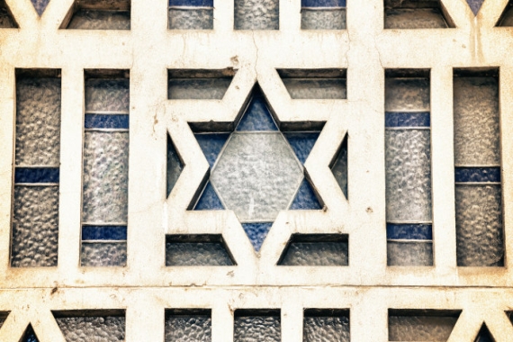 Stained glass window featuring a Star of David